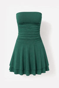 A strapless dark green mini dress with a ruched bodice and flared skirt, shown against a plain white background.