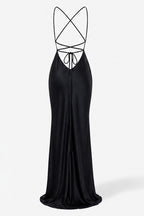A floor-length black satin slip dress with a strappy open back design, shown against a plain light gray background.