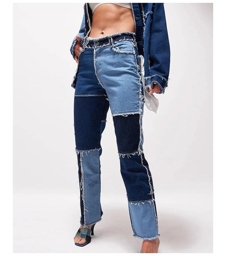 Person wearing a patchwork denim outfit on a white background