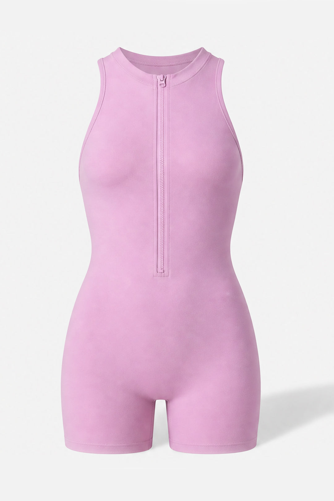 A sleeveless light pink one-piece jumpsuit with a short front zipper, displayed on a clean, light gray background.