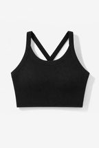 A black cropped tank top with wide straps that cross in the back, displayed flat against a clean white background.