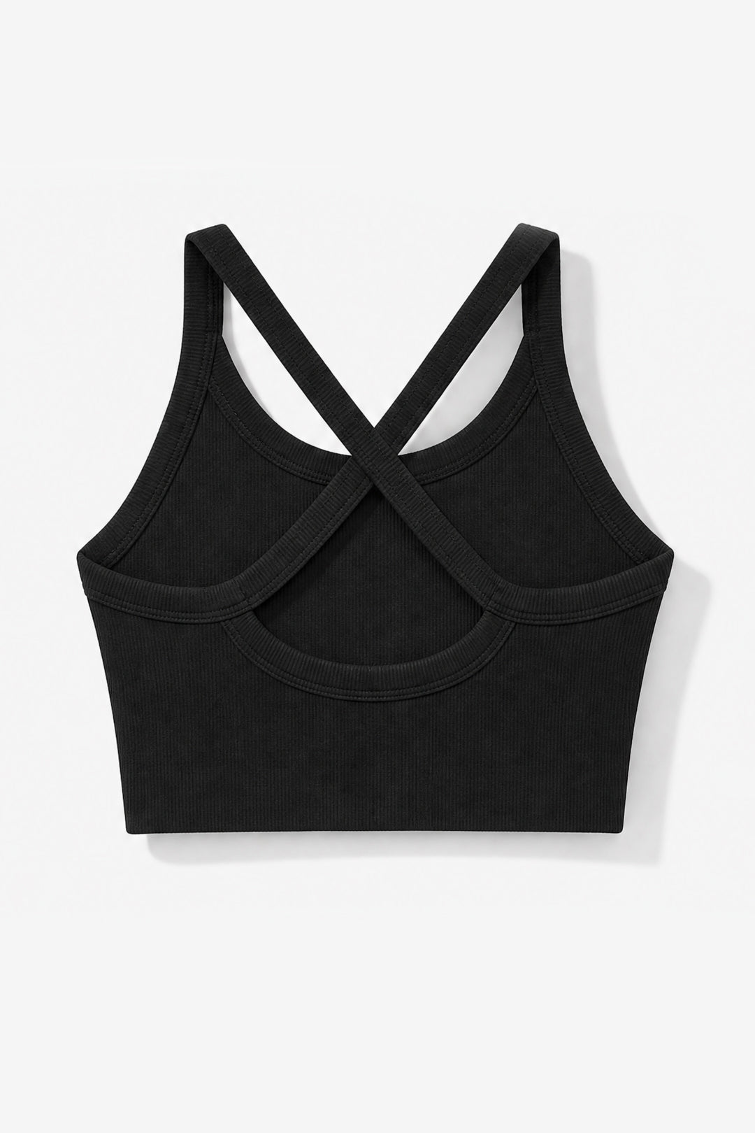 A black cropped sports bra with a crisscross back strap design, shown from the back on a light gray background.