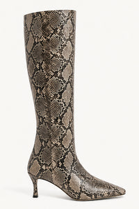 A single knee-high boot with a pointed toe and kitten heel, featuring a brown and beige snakeskin pattern, shown against a plain light background.