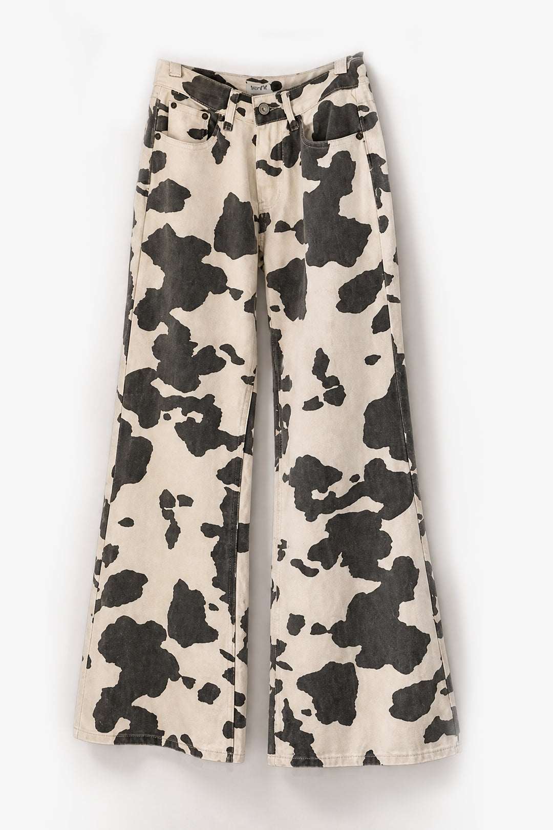 Wide-leg pants featuring a black and beige cow print pattern, displayed against a clean white background.
