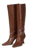 A pair of knee-high brown leather boots with a pointed toe and a low block heel, shown on a plain white background.